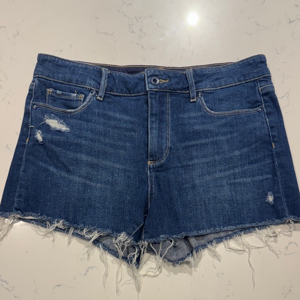 PAIGE Distressed Blue Jean Shorts - Mid-rise